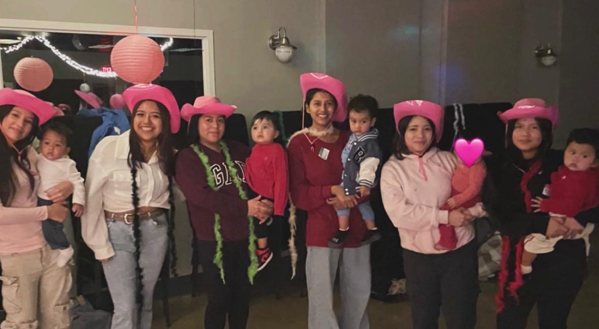 Moms and children together at a Young Lives Club gathering